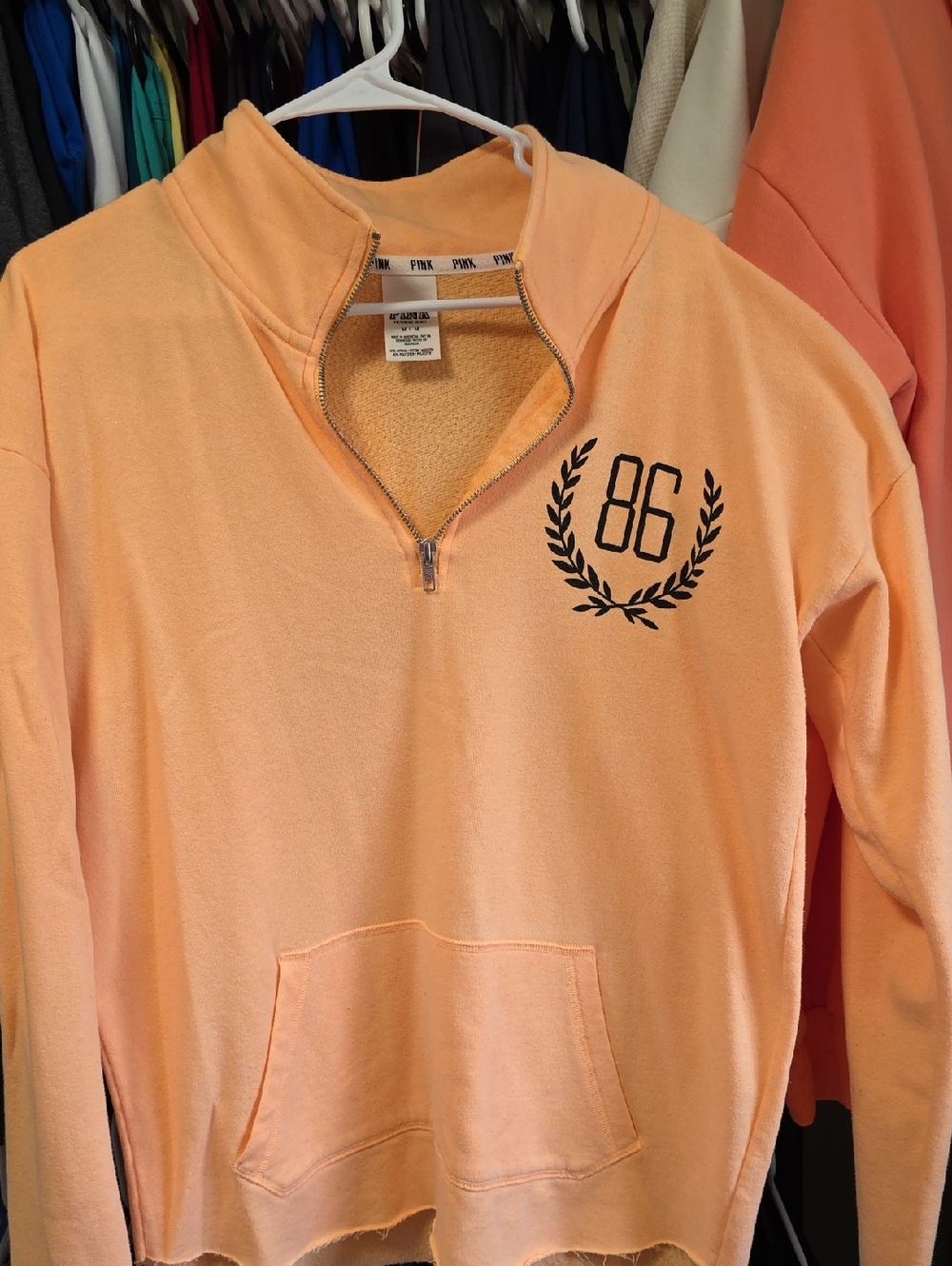 PINK Half-Zip Sweatshirt in Peach with '86' Laurel Graphic